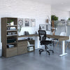 Viva L-Shape Height Sit and Stand Adjustable Workstation with an Adjustable Dual Monitor Arm with Storage tower Image